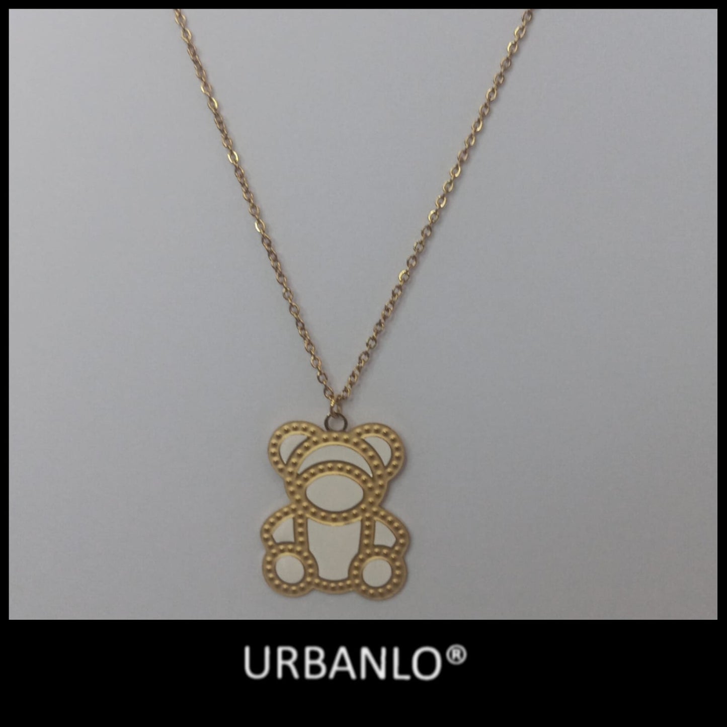 Collana in Acciaio dorato con pendente ad orsetto bianco e dorato