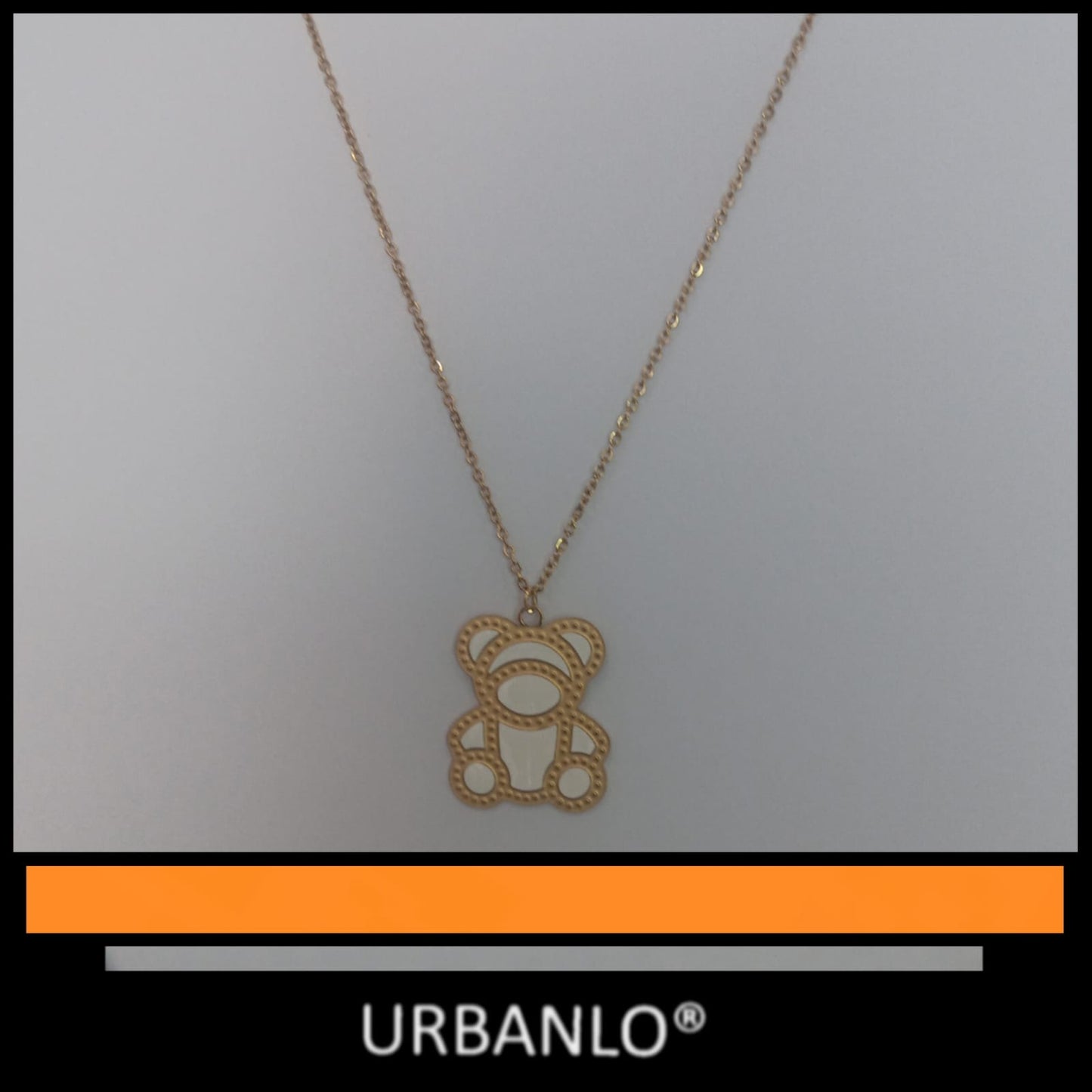 Collana in Acciaio dorato con pendente ad orsetto bianco e dorato