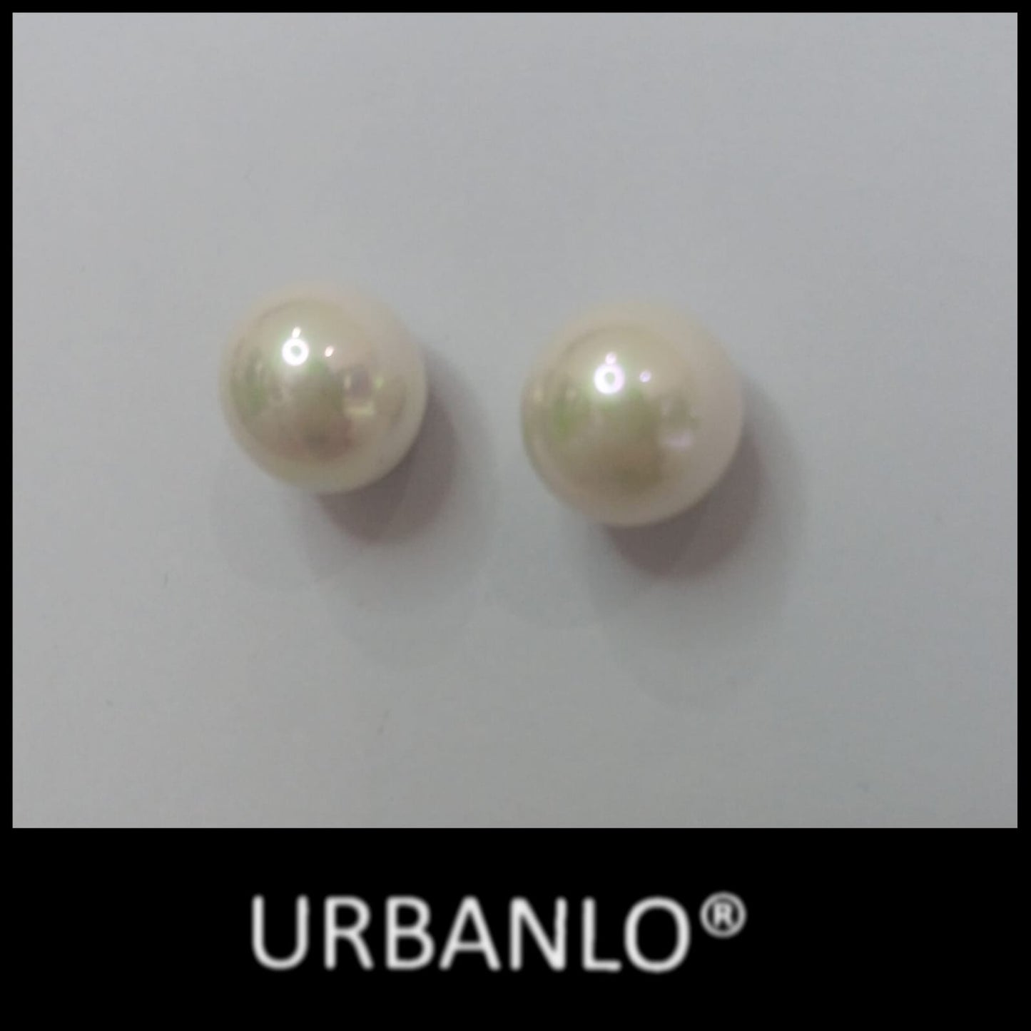 Orecchini in Acciaio dorato perle