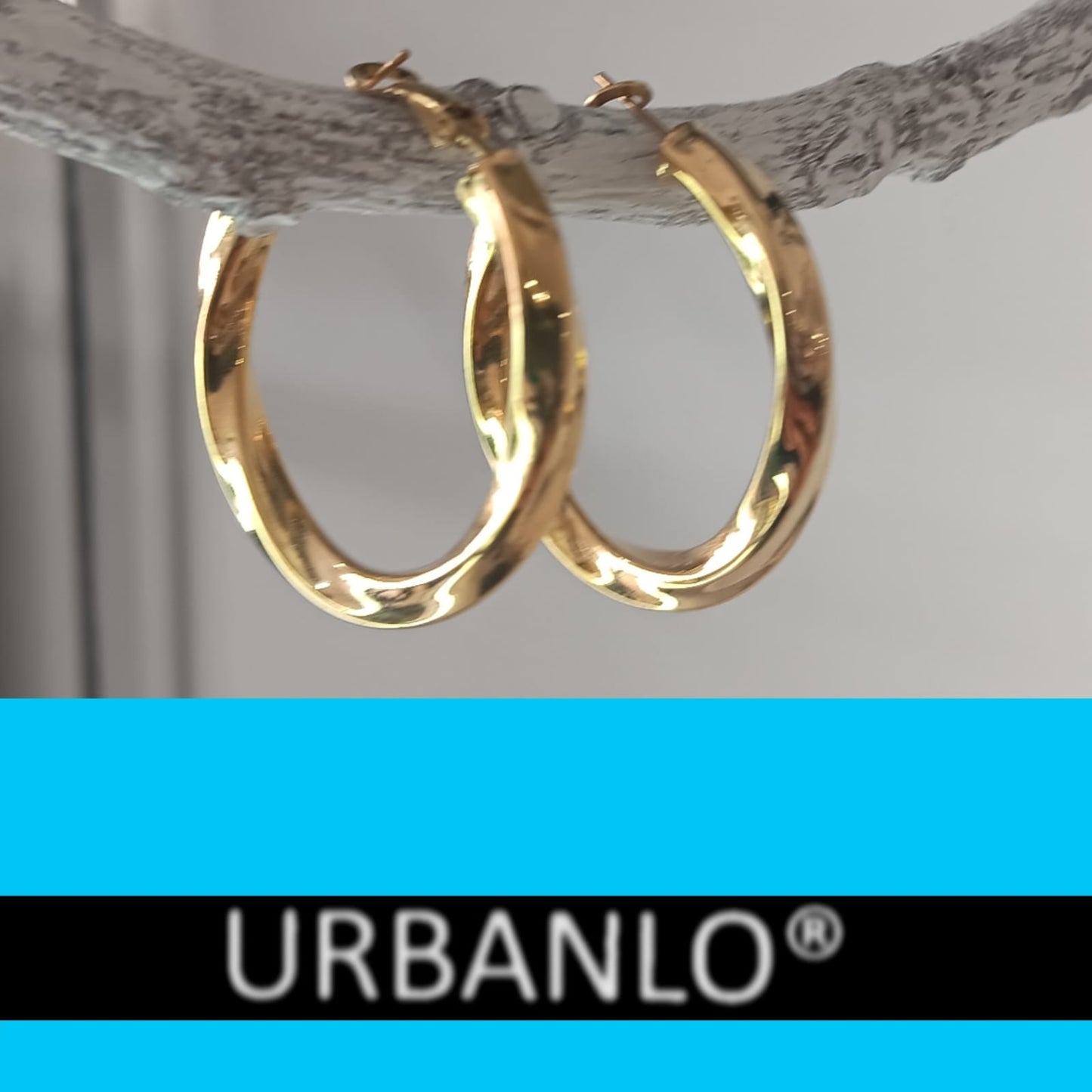 Orecchini in Acciaio dorato ondulati