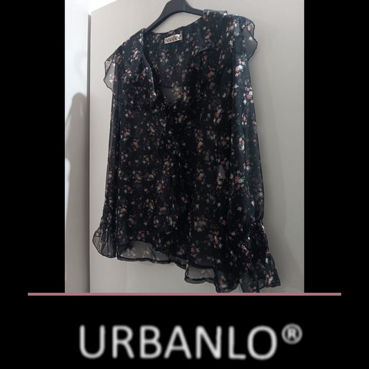 Maglia trasparente a fiorellini base nera