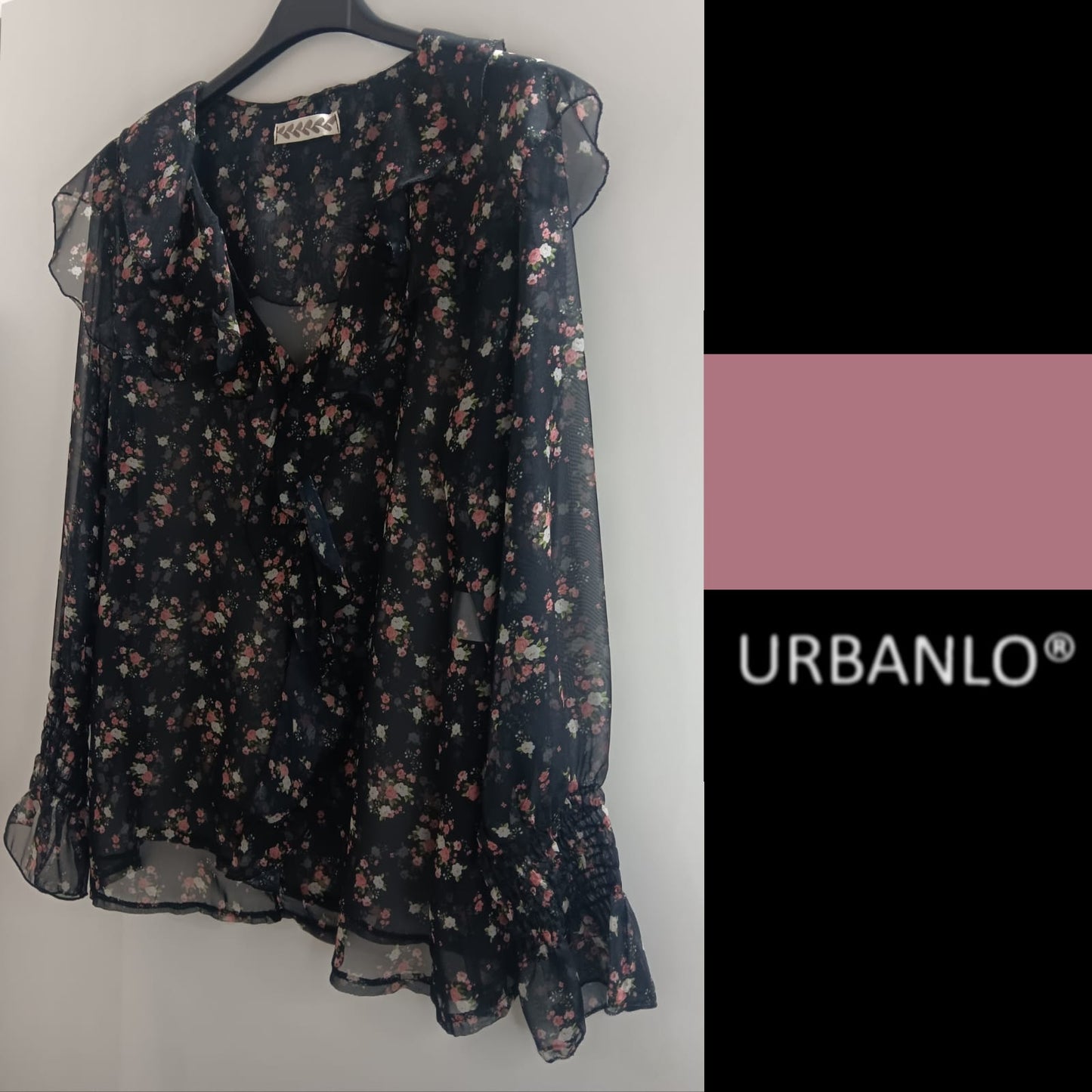 Maglia trasparente a fiorellini base nera